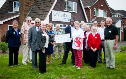 WS-PPG present cheque to Save the Children