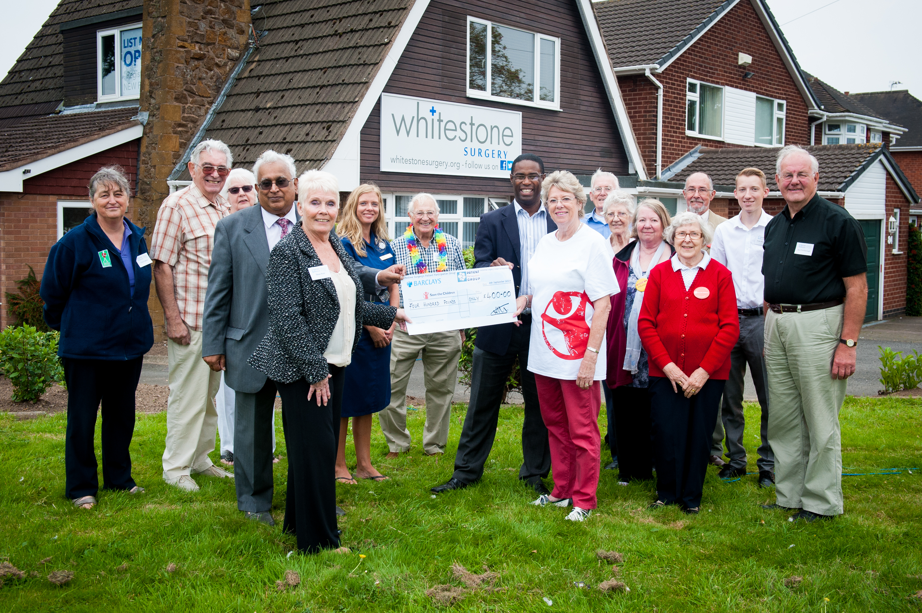 WS-PPG present cheque to Save the Children