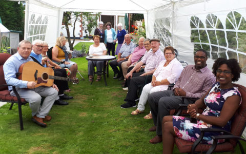 Fun at the Caring Café Cream Tea and Cake Party